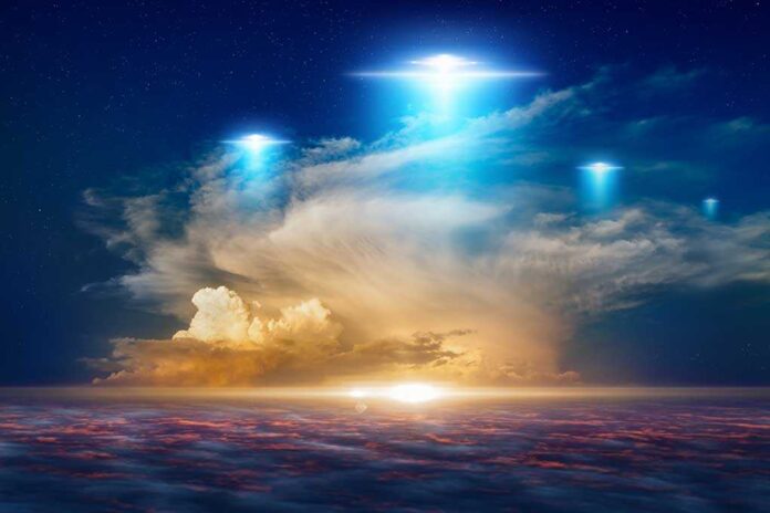 1144721378 featured image Glowing lights above dramatic sunset clouds