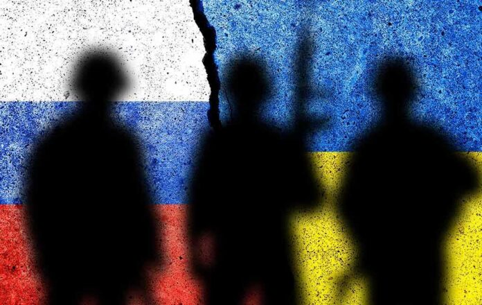 2095910923 featured image Silhouettes against split Russian and Ukrainian flags