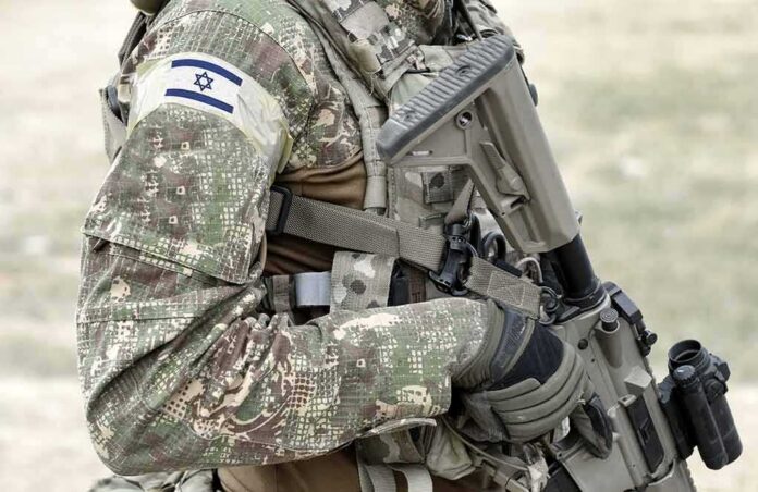 1917131027 featured image Soldier in camouflage gear with Israeli flag patch