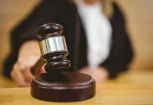 Judge striking gavel in a courtroom