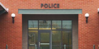 Entrance of a modern police station with brick facade