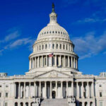 Congress STRIPPED of VIP Privilege, And They’re Fuming! US Capitol Building against blue sky.