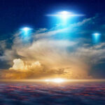 Admiral Makes EXPLOSIVE UFO Claim Glowing lights above dramatic sunset clouds.