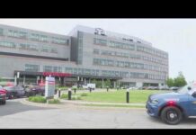 Officer GUNNED Down In Hospital ER! Northwestern Indiana sheriff's deputy shot after bringing stranded driver to hospital