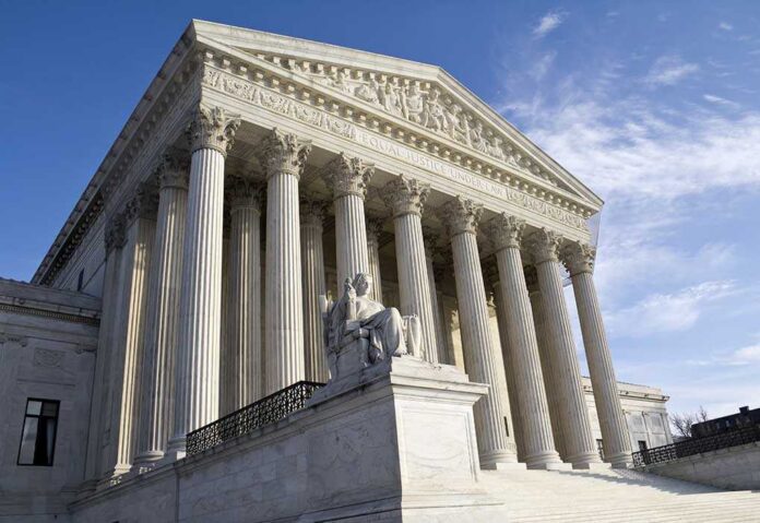 Supreme,Court,Building,In,Washington,,Dc,,United,States,Of,America Exterior view of the Supreme Court building with columns and a statue of justice