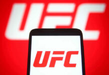Patriotic UFC Fighter SLAMMED For Epic Obama Rant UFC logo on phone screen and background.