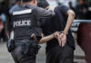 Violent Protestors BREAK Police Officer’s Back! Police officer arrests handcuffed person.