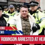 Tommy Robinson arrested at heathrow