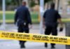 Footage Shows PSYCHO Throwing Knives at Cops Before Shooting! Police officers walking past caution tape at a crime scene