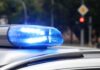 Police car blue siren light flashing