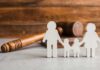 Dem Candidate Married Cousin – Fathered Children! Paper cutout family with gavel in background