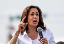 Kamala’s Endorsement Snubbed — Dem Says NO THANKS! Woman in white shirt speaking into a handheld microphone