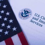 American flag beside U.S. immigration document