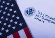 American flag beside U.S. immigration document