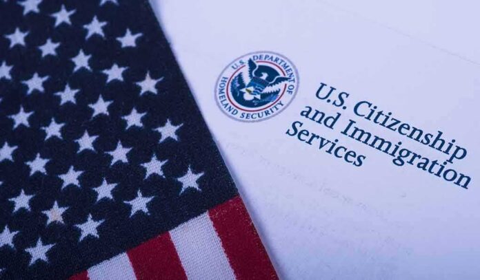 American flag beside U.S. immigration document