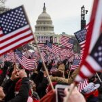 Mall Mayhem Upends Trump’s Grand Spectacle Crowd waving American flags near the U.S. Capitol