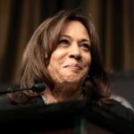 woman speaking at a podium