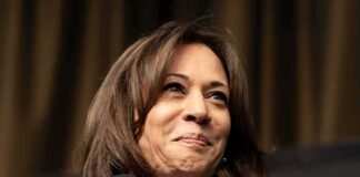 woman speaking at a podium