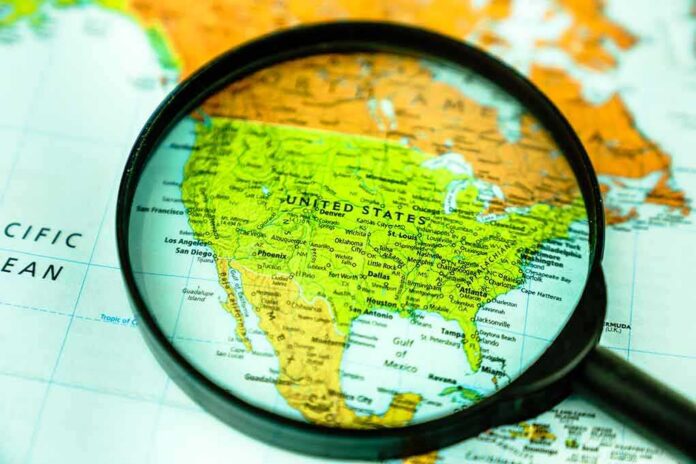 Magnifying glass focusing on a map of the United States