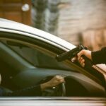Kids Prank Turns DISASTER – 3 SHOT! armed person pointing a gun at a driver in a car