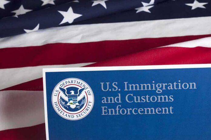shutterstock_300476915 U.S. ICE document against American flag