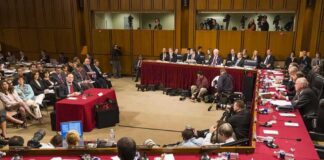 Patrick Leahy and Samuel Alito at a Senate hearing with committee and press present
