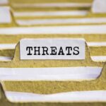 Wannabe Trump Assassin Leaves Jury Stunned During Court Appearance index tab labeled threats in a filing organizer