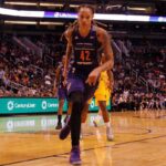 Brittney Griner driving to the basket during a basketball game