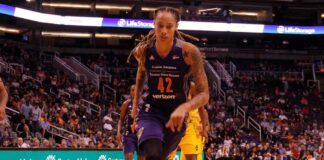 Brittney Griner driving to the basket during a basketball game