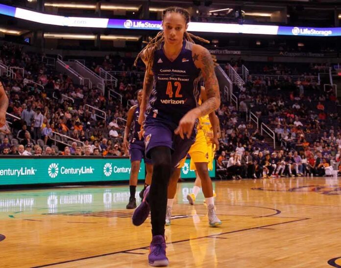 Brittney Griner driving to the basket during a basketball game