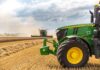 Trump Releases $47BN Aid – See Who’s Getting It A green tractor in a wheat field.