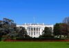 White House TORCHES Dems Desperate Reparations Push The White House facade with flag and gardens