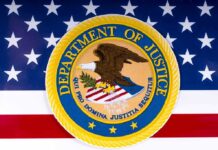 Trump Warned Them, Now DOJ Is Suing State Department of Justice seal on American flag background