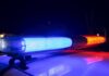 Elite Runner Mowed Down Night Before Marathon Police car light bar flashing blue and red at night