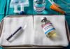 Trump Weighs In On Botched Execution Medical tray with syringe and pentobarbital vials on gauze