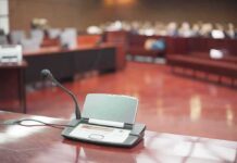 Conference microphone on a desk in a courtroom