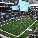 Jason Kelces Live-Mic Slip Stuns NFL Booth American football stadium interior with large central video board